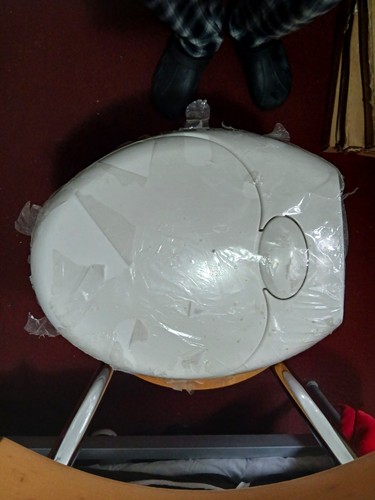 White oval plastic toilet - white,