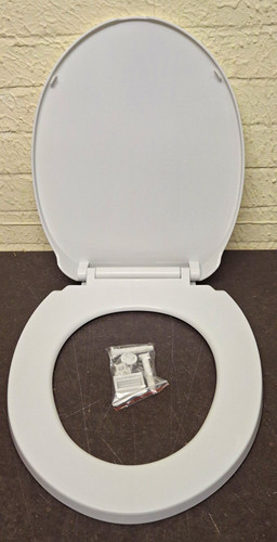 Brand new white oval toilet - brand,